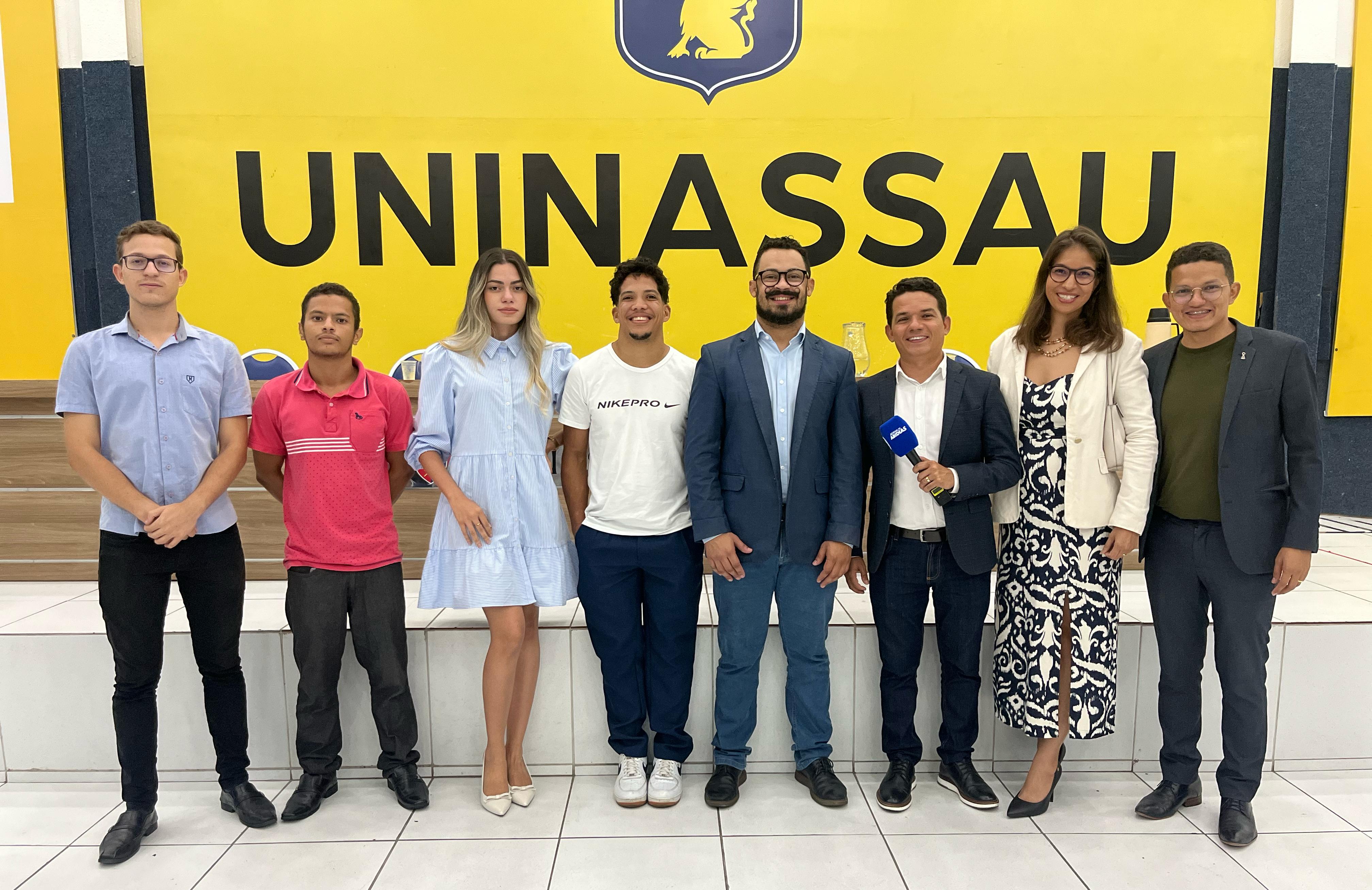 Palestrante e organizadores do evento